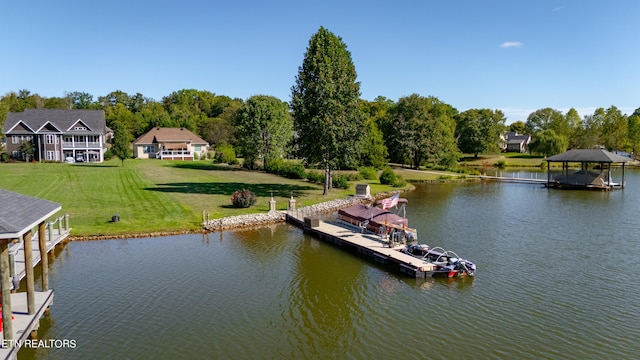 view of dock featuring a water view and a lawn