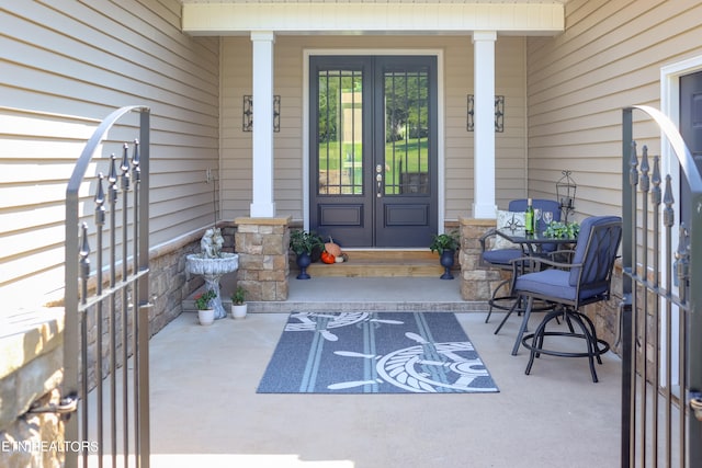 doorway to property featuring french doors