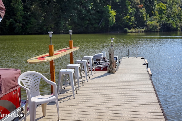 view of dock featuring a water view