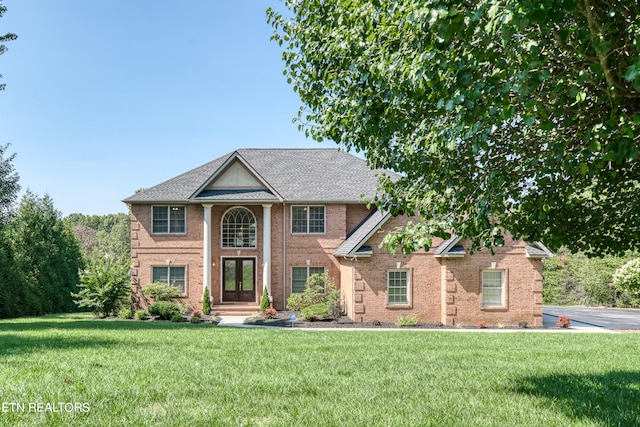 view of front facade with a front lawn