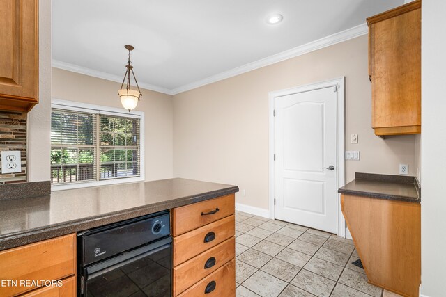 kitchen featuring crown molding, light tile patterned flooring, beverage cooler, and decorative light fixtures