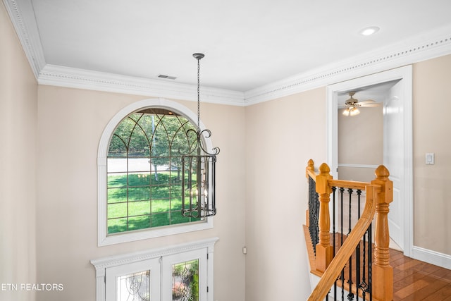 room details with ceiling fan, hardwood / wood-style flooring, and ornamental molding