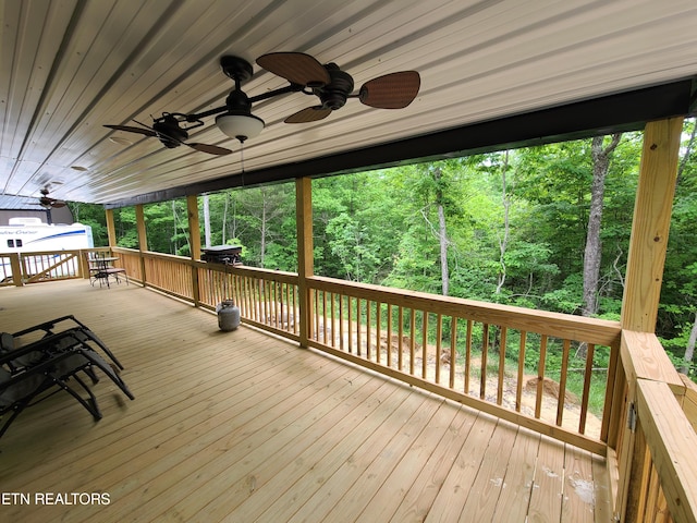 wooden deck with ceiling fan