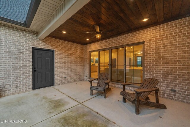 view of patio / terrace featuring ceiling fan