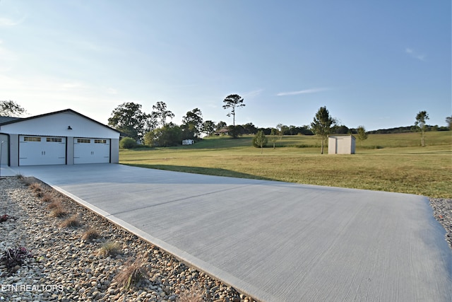 exterior space with a yard and a shed