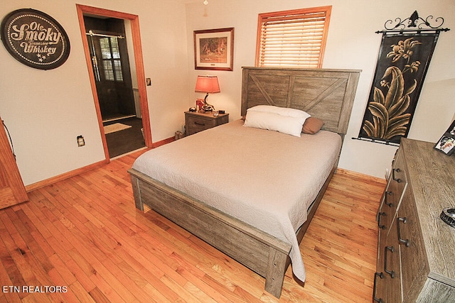 bedroom featuring light wood-type flooring