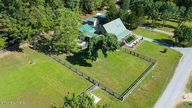 birds eye view of property with a rural view