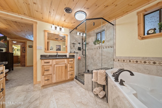 bathroom with plus walk in shower, vanity, and wood ceiling