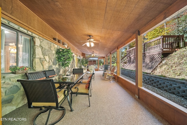 view of patio featuring ceiling fan and a deck