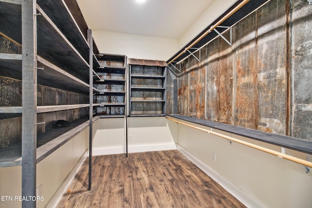 walk in closet featuring hardwood / wood-style floors