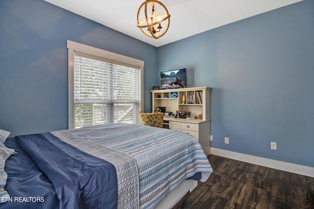 bedroom featuring dark hardwood / wood-style flooring