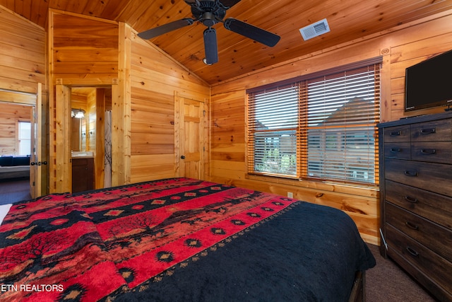 889 Great Smoky Way, Gatlinburg, TN 37738 - carpeted bedroom with wood walls, lofted ceiling, multiple windows, and ceiling fan