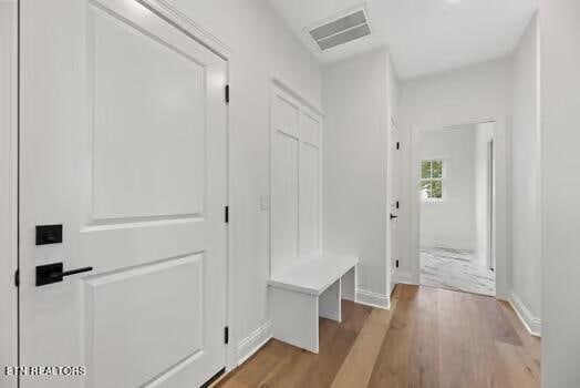 mudroom featuring light hardwood / wood-style flooring