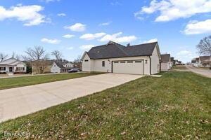 view of property exterior with a lawn