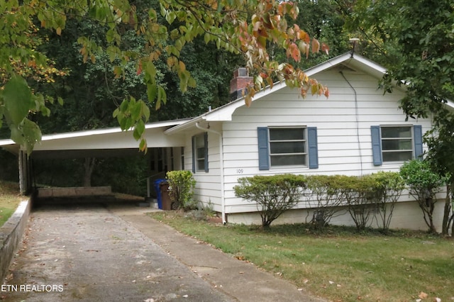 view of front of house with a carport