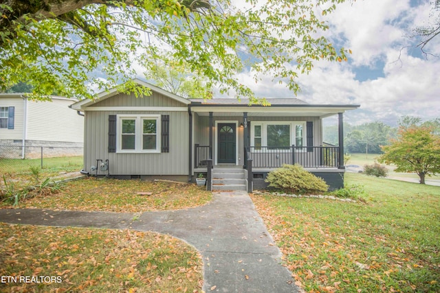 bungalow-style house featuring a front yard and a porch