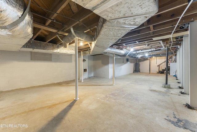 basement featuring water heater