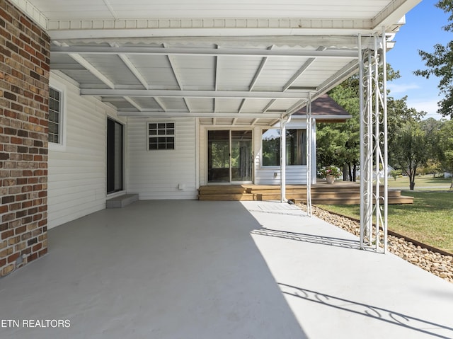 view of patio / terrace with a carport