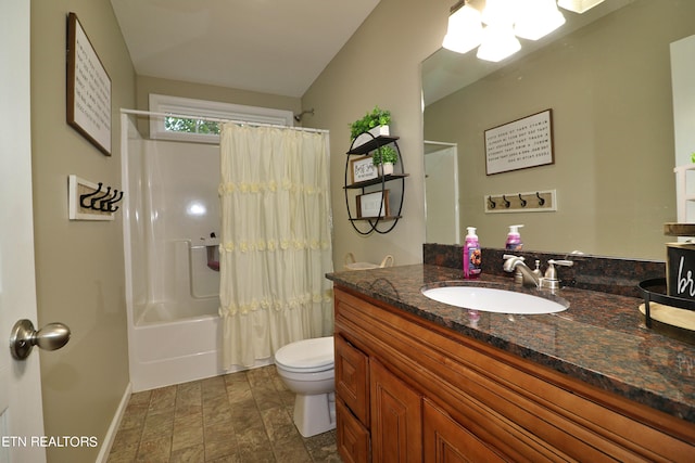 full bathroom with shower / bath combo with shower curtain, vanity, and toilet