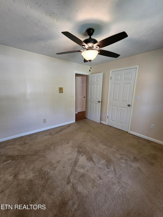5725 Academy Dr, Morristown, TN 37814 - unfurnished bedroom featuring carpet, ceiling fan, and a textured ceiling