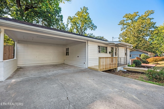 view of front of home featuring a carport