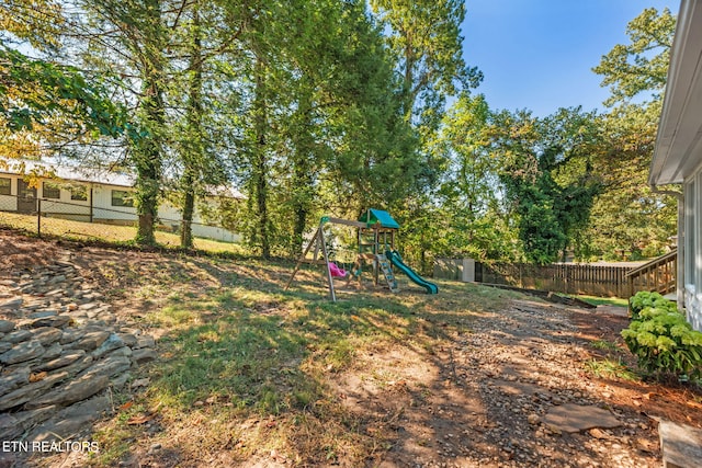 view of yard with a playground