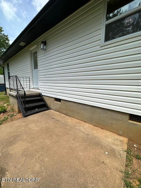 view of home's exterior with a patio