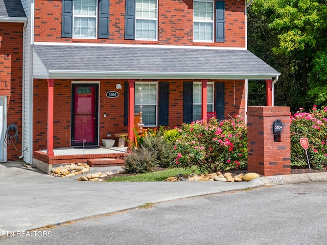 entrance to property with covered porch