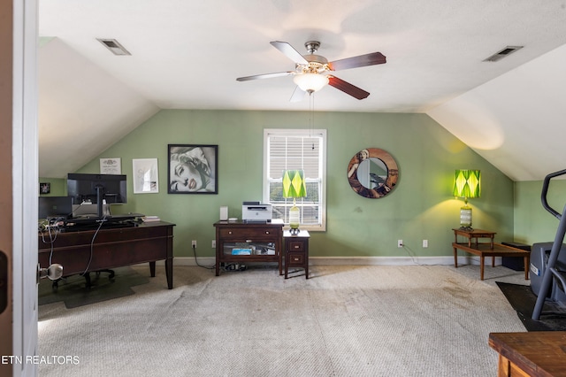 carpeted home office featuring ceiling fan and lofted ceiling