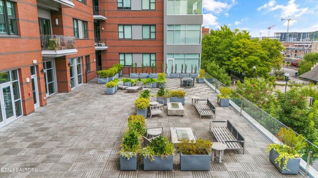 surrounding community featuring an outdoor hangout area