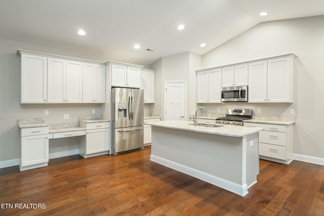 kitchen featuring white cabinetry, appliances with stainless steel finishes, and dark hardwood / wood-style floors