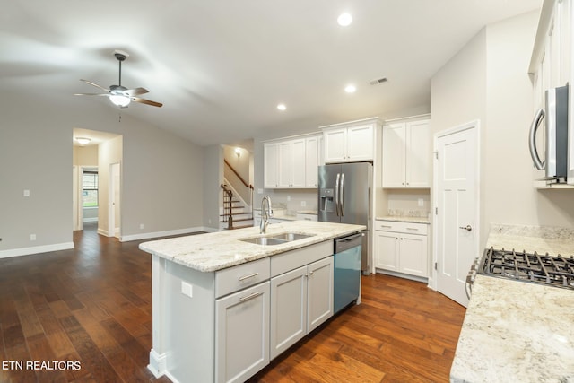 kitchen featuring white cabinetry, an island with sink, dark hardwood / wood-style floors, and appliances with stainless steel finishes