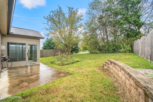 view of yard with a patio area