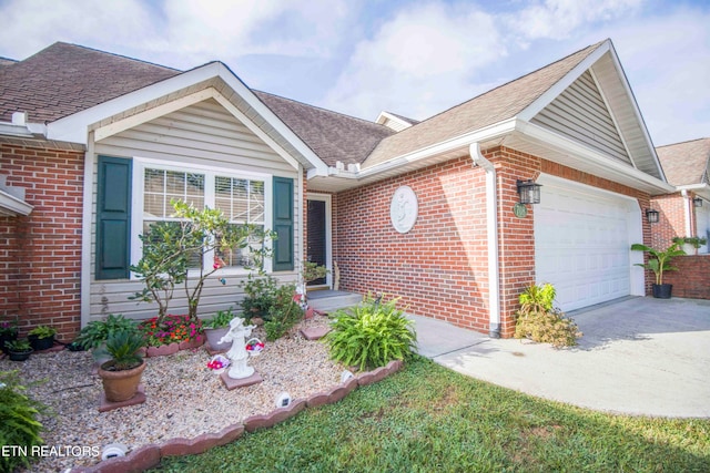 ranch-style house featuring a garage