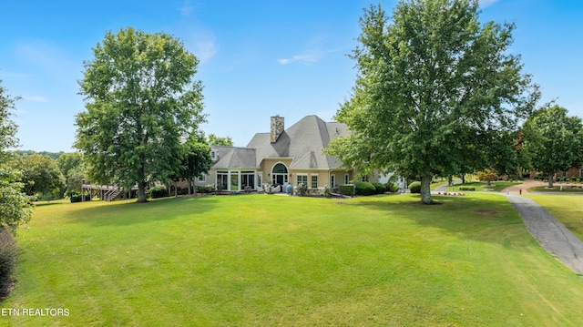 view of front facade with a front lawn