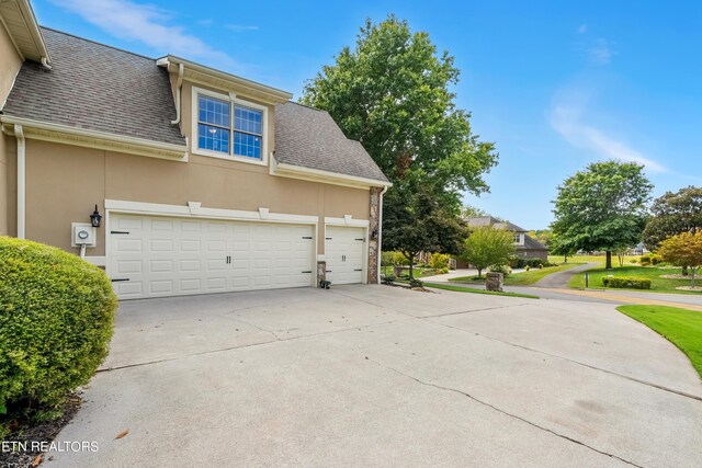 exterior space featuring a garage