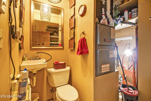 bathroom with sink and toilet