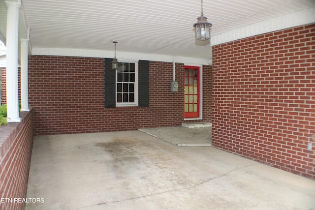 view of patio / terrace featuring a carport