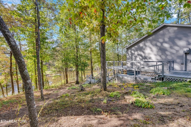 view of yard featuring a deck