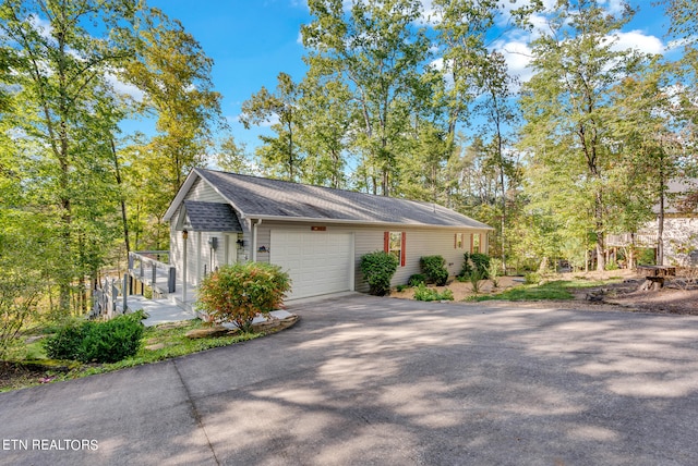 view of property exterior featuring a garage