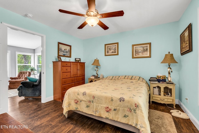 bedroom featuring dark wood-type flooring and ceiling fan