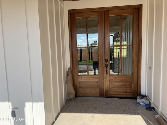 doorway to property featuring french doors