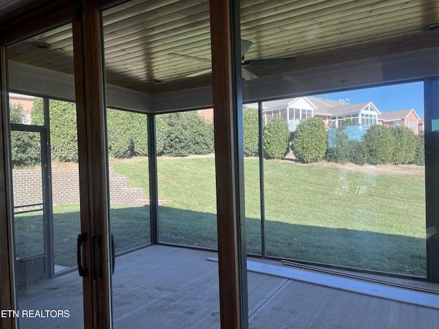 doorway to outside with light hardwood / wood-style floors and a wealth of natural light