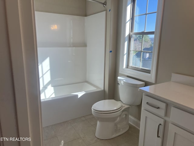 full bathroom featuring tile patterned floors, vanity, toilet, and shower / bathing tub combination