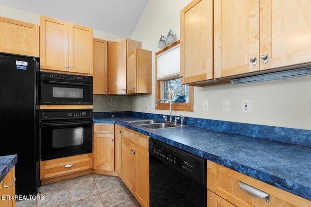 kitchen featuring lofted ceiling, black appliances, sink, light tile patterned floors, and light brown cabinetry