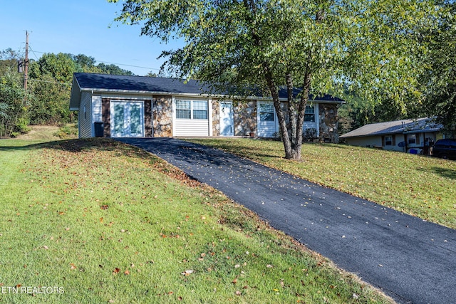 ranch-style house with a front yard