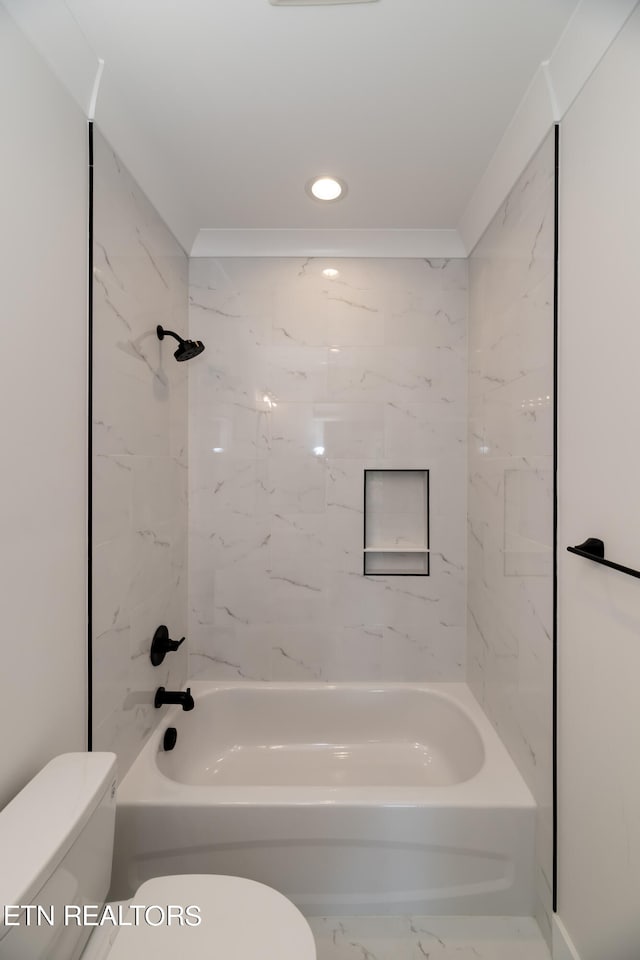 bathroom with recessed lighting, shower / bathing tub combination, toilet, and marble finish floor