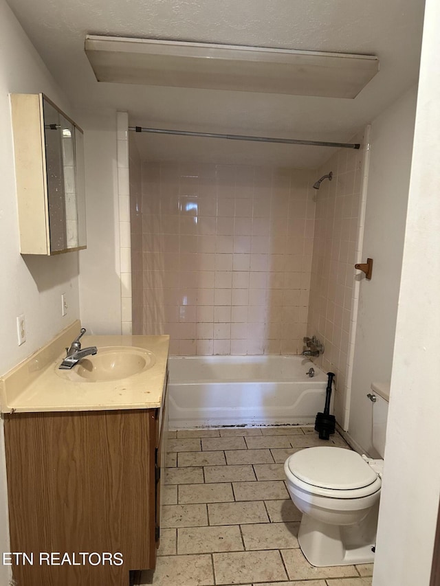 full bath featuring toilet, shower / bathing tub combination, and vanity