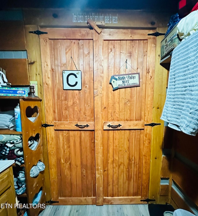 room details featuring wooden walls