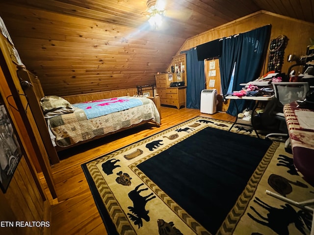 bedroom with wood ceiling, wood-type flooring, lofted ceiling, and wood walls